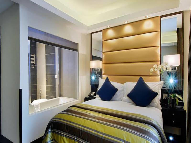Park Grand Mayfair Londres Extérieur photo A bedroom at the hotel